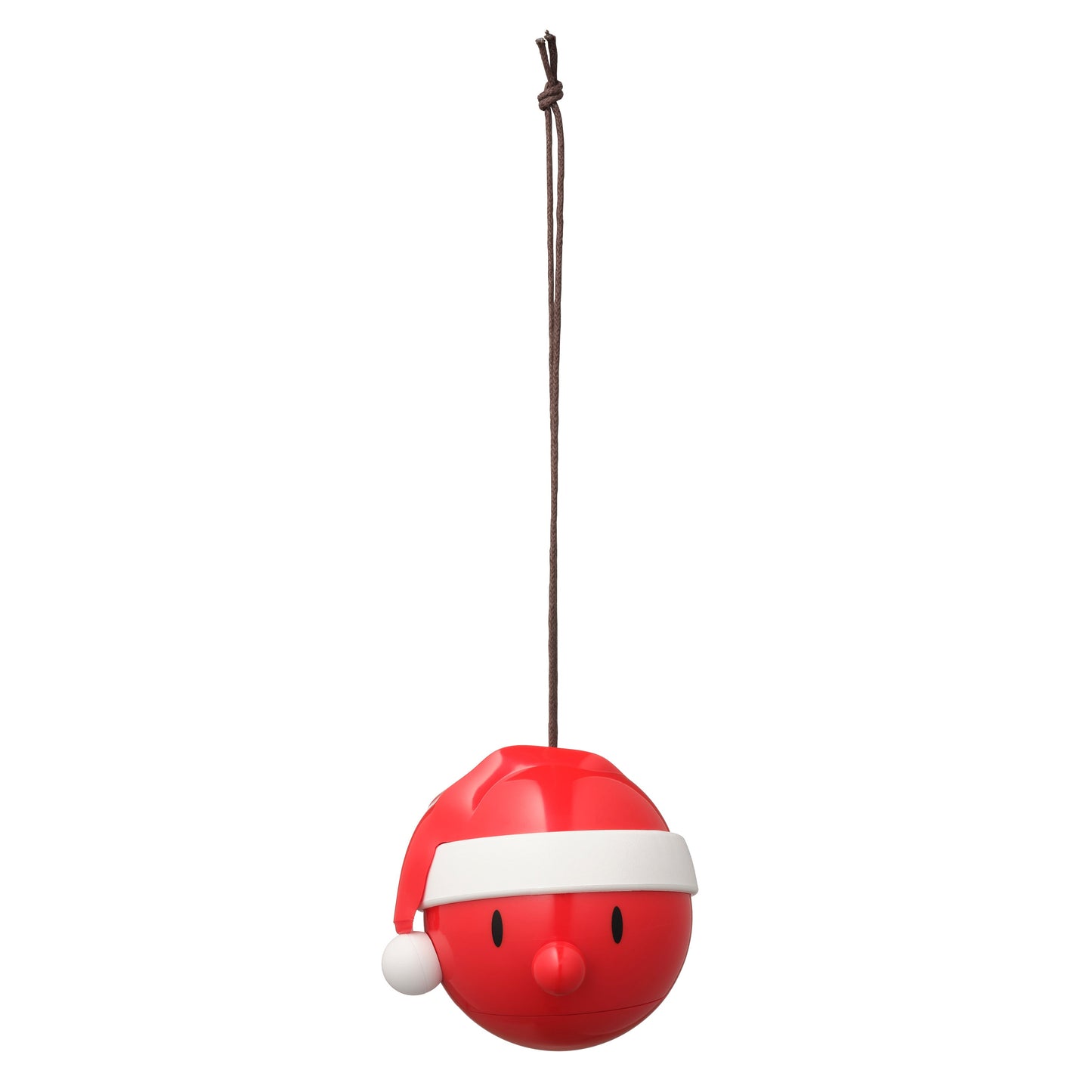 Red and white Christmas ornament shaped like a round face with a smile on a white background